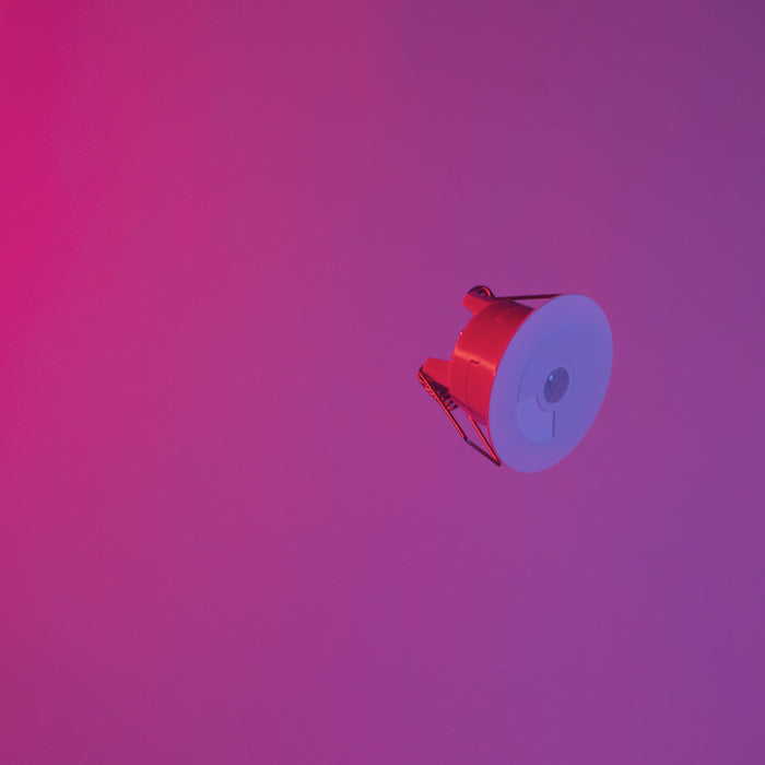 Faradite motion sensor (pir) floating in red space