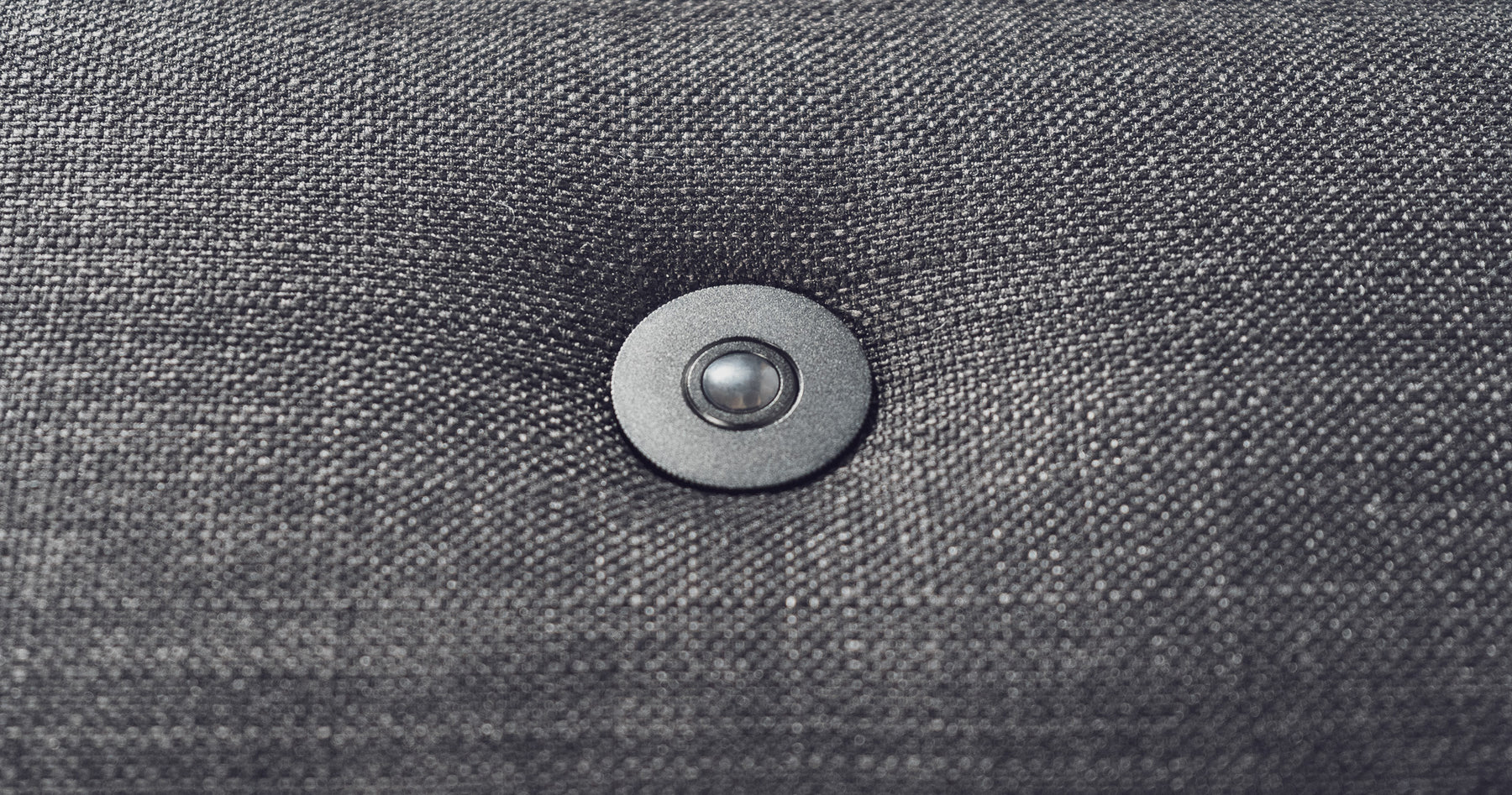 Pinhole PIR motion sensor installed in cinema chair